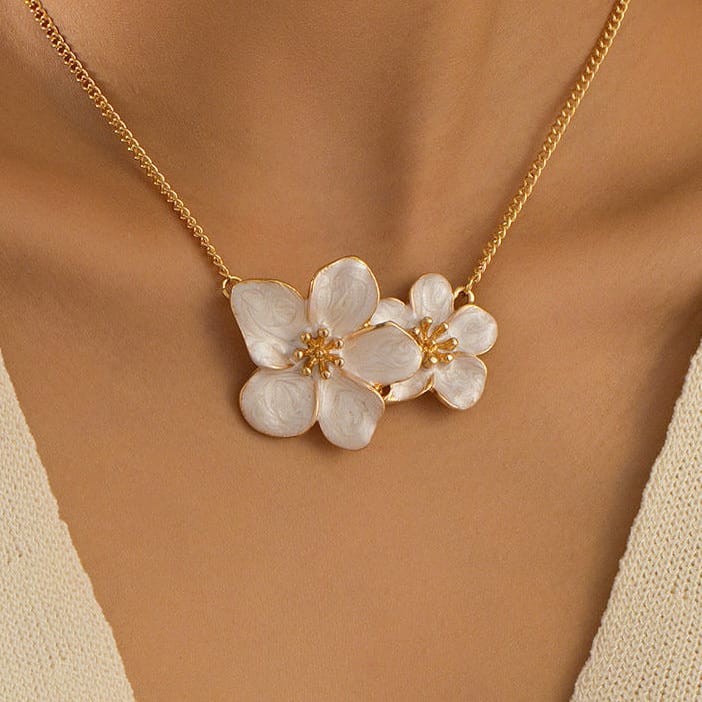Collar dorado con dije de perla