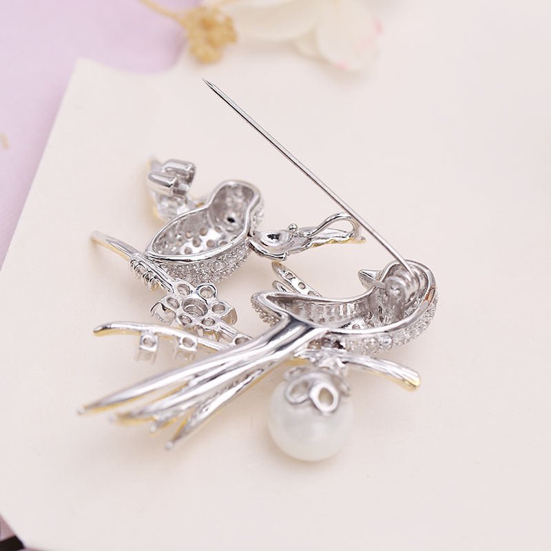 Broche de tórtolas encantadas – imagen 3
