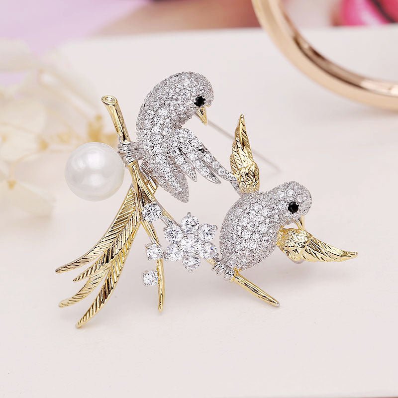 Broche de tórtolas encantadas