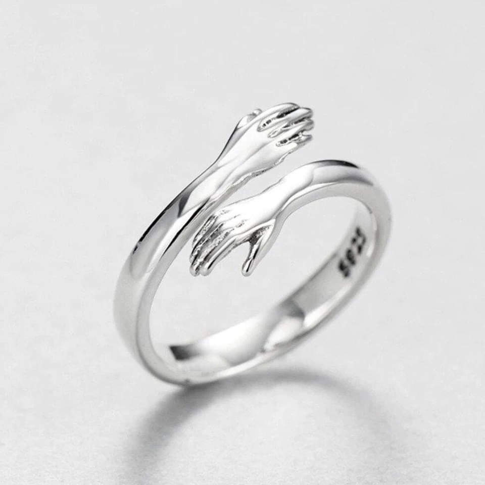 Anillo ajustable de plata tipo abrazo