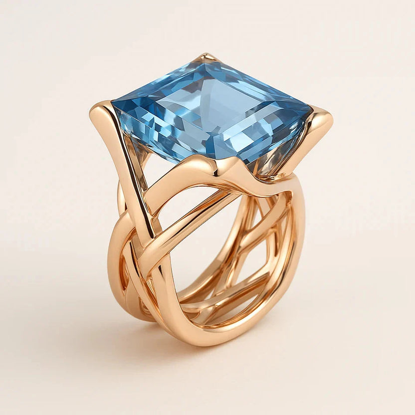 Anillo vintage dorado con piedra preciosa azul