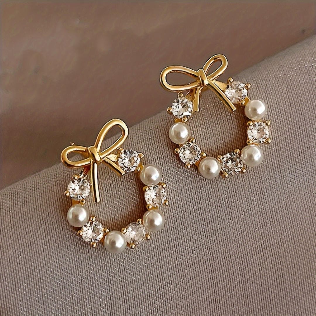 Pendientes de perla con halo de lazo