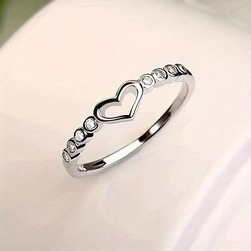 Anillo de corazón abierto con cristales