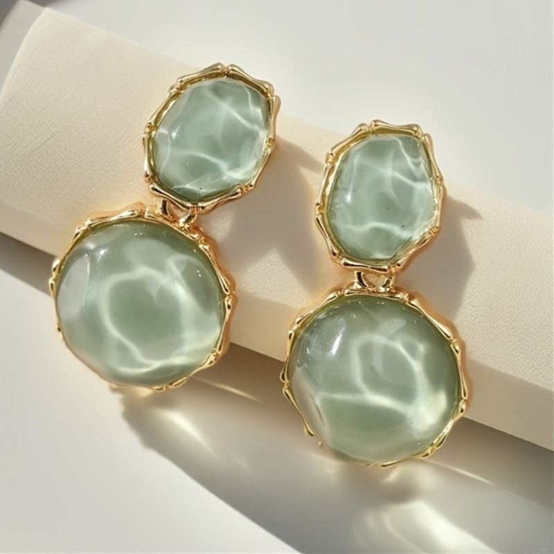 Pendientes bohemios geométricos ovalados de resina con diseño de gota