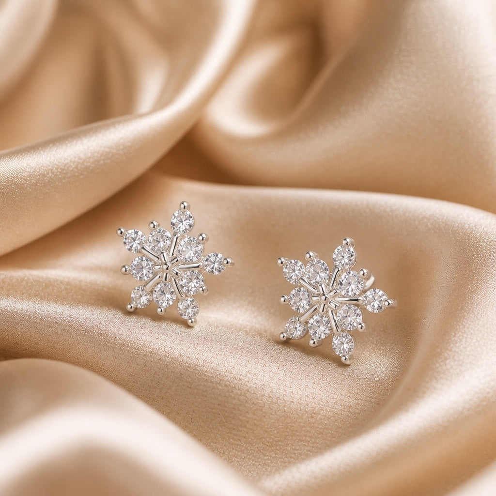 Pendientes de copo de nieve en oro blanco