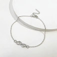 Tobillera de plata con dije infinito delicado