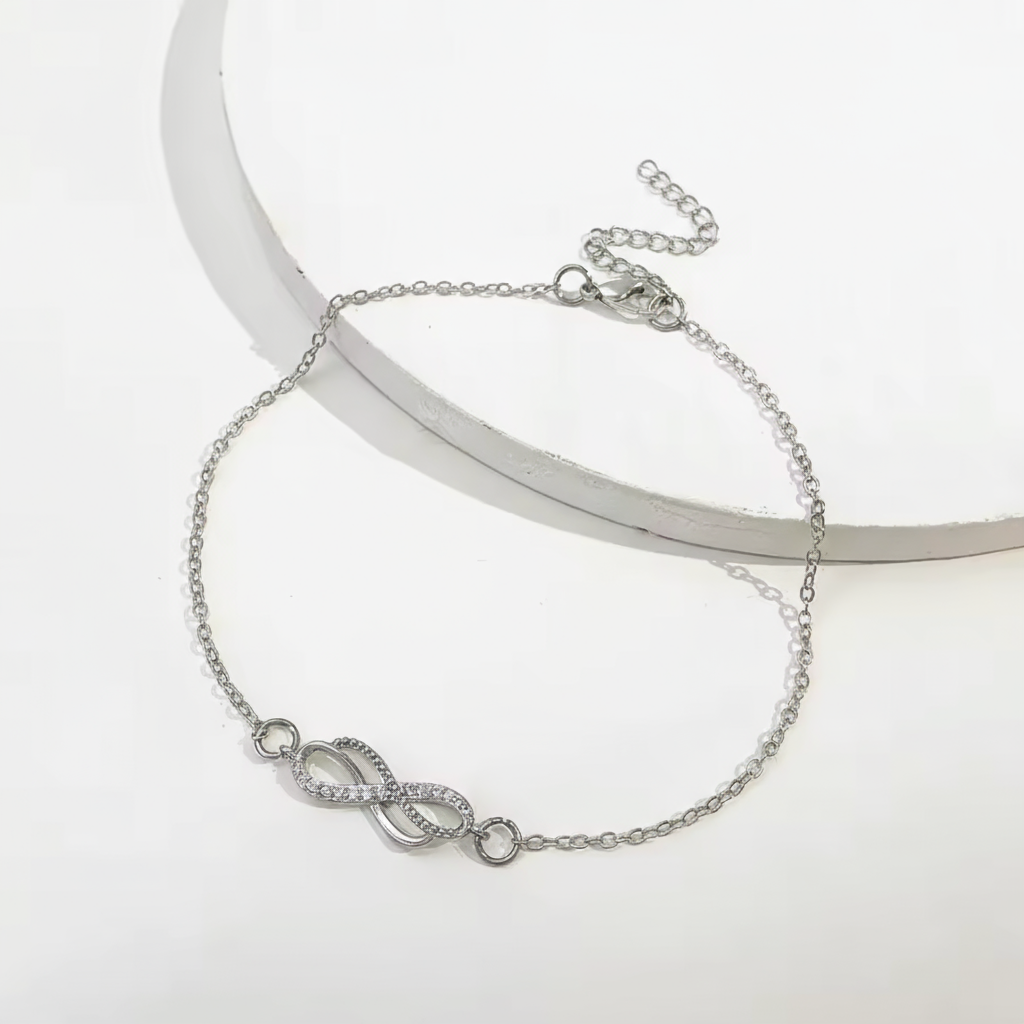 Tobillera de plata con dije infinito delicado