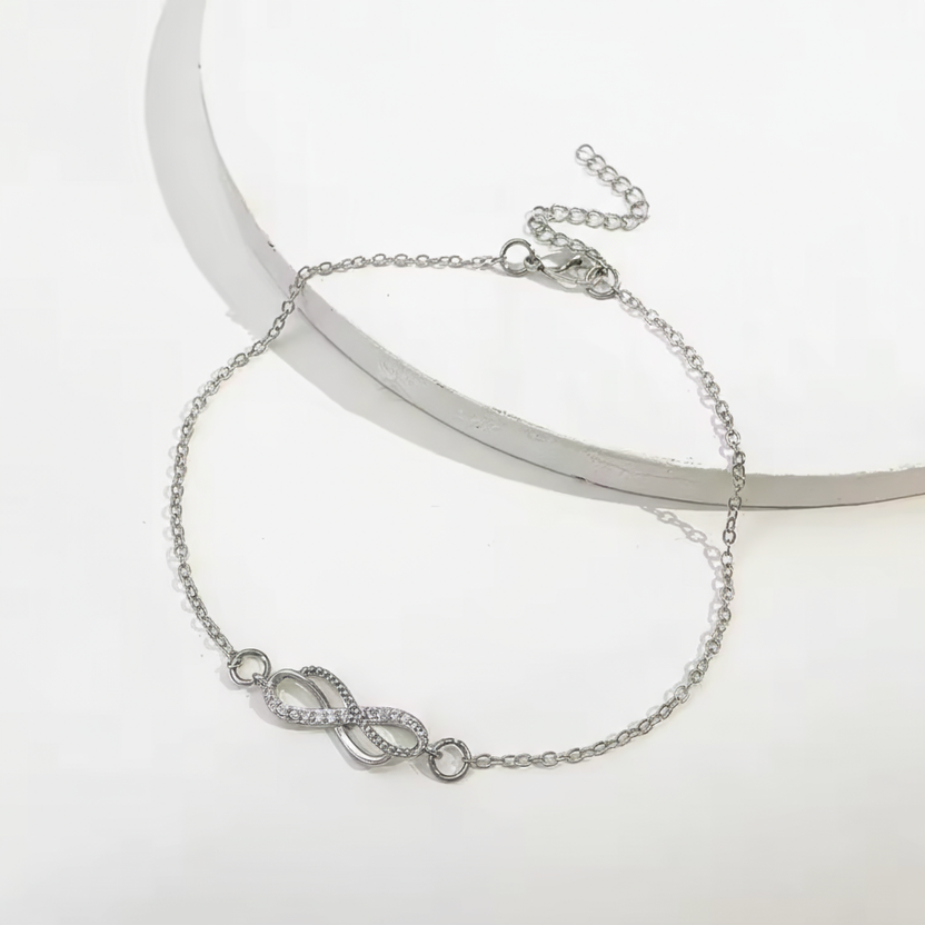 Tobillera de plata con dije infinito delicado