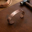 Pulsera de cobre con fronda de brasa