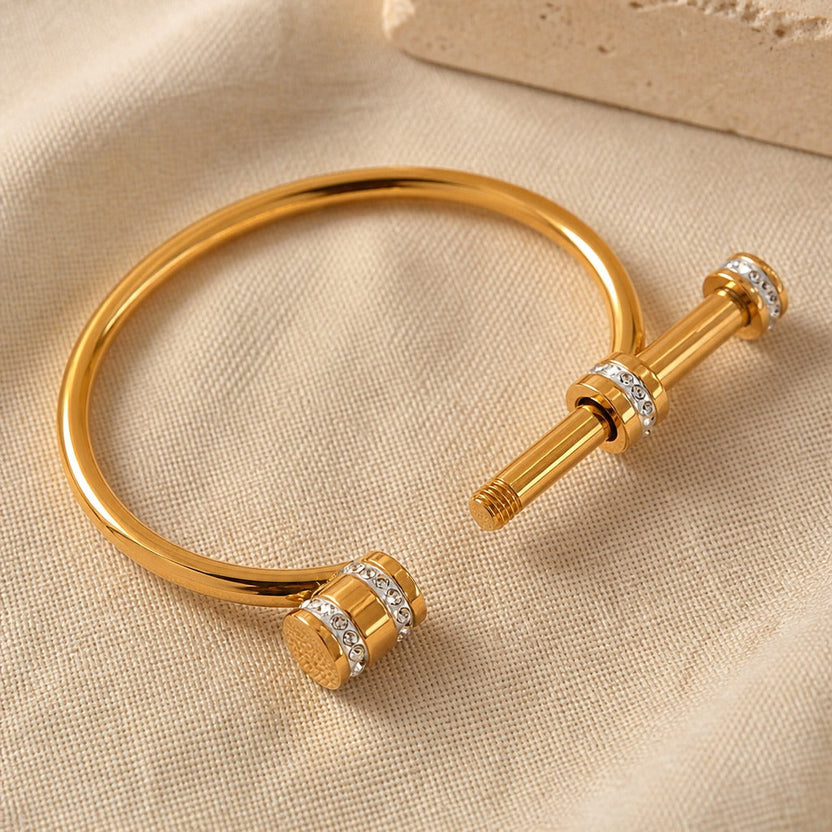 Brazalete rígido dorado opulento