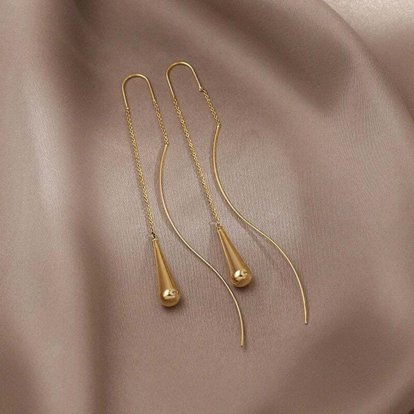Pendientes dorados de borla en forma de gota