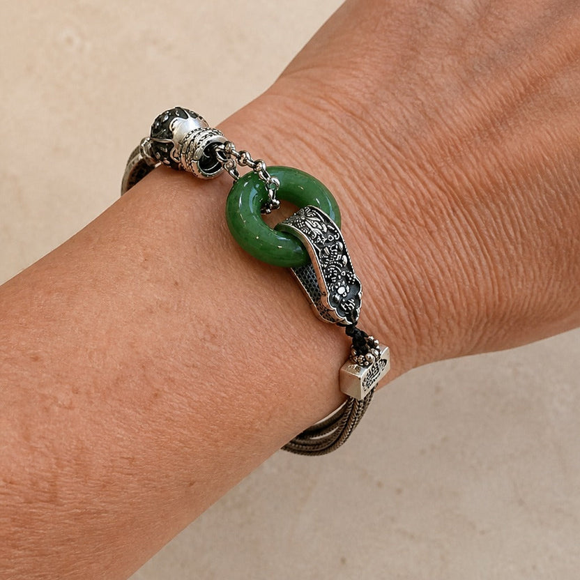 Pulsera vintage de dijes Dynasty