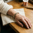 Pulsera de cobre con trenzado infinito