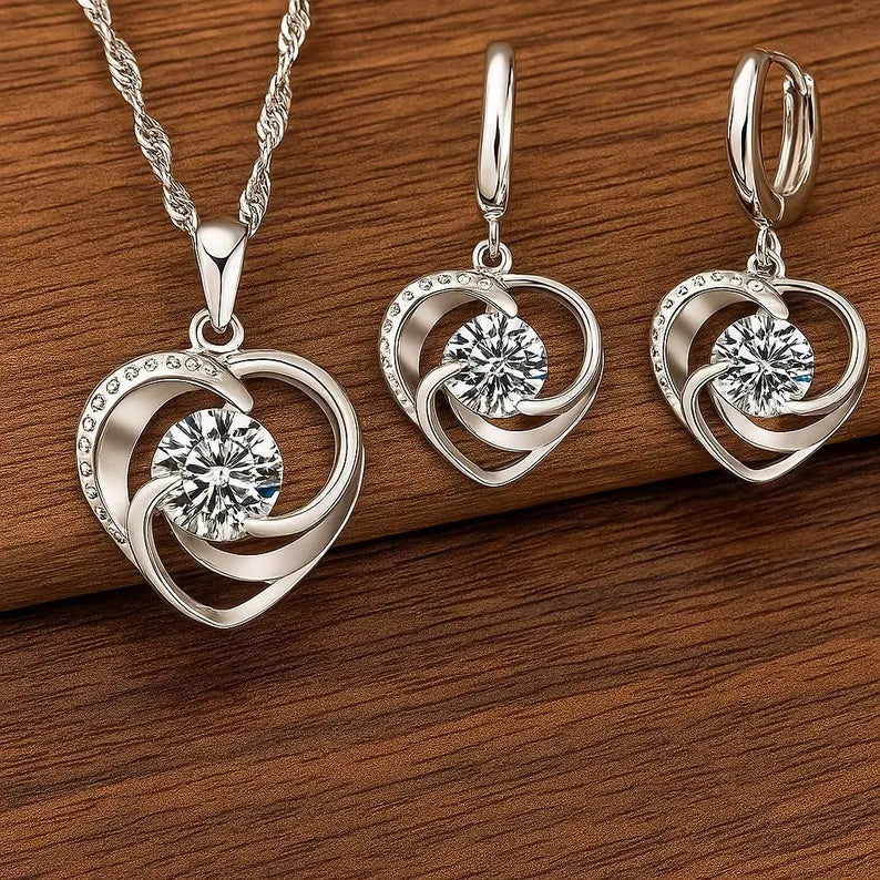 Collar y pendientes de corazón de plata de ley