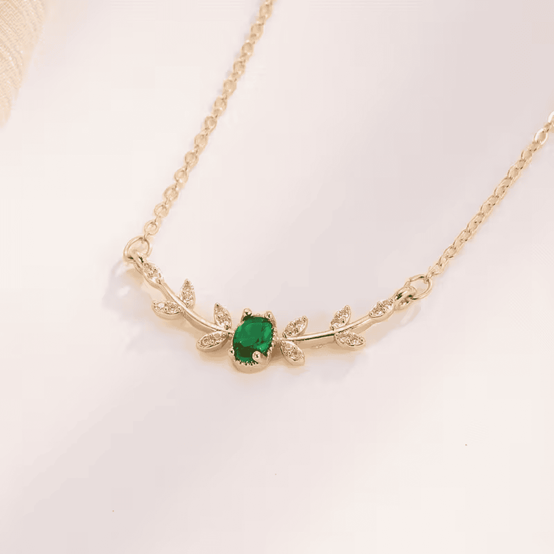 Collar esmeralda de flor de laurel