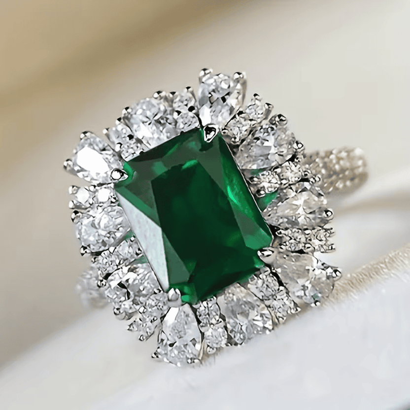 Anillo halo esmeralda imperial
