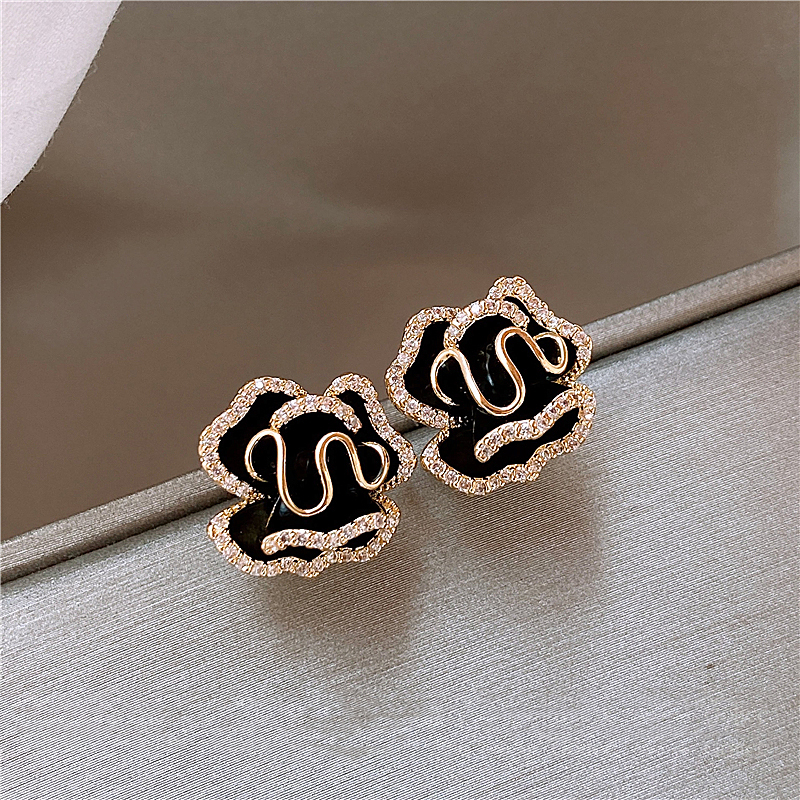 Pendientes elegantes de loto negro