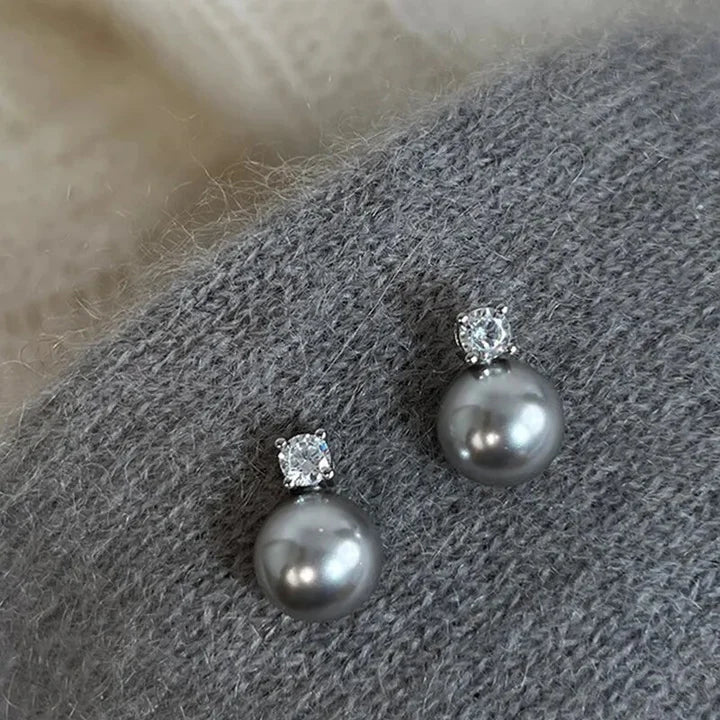 Pendientes elegantes de circonita con perla negra