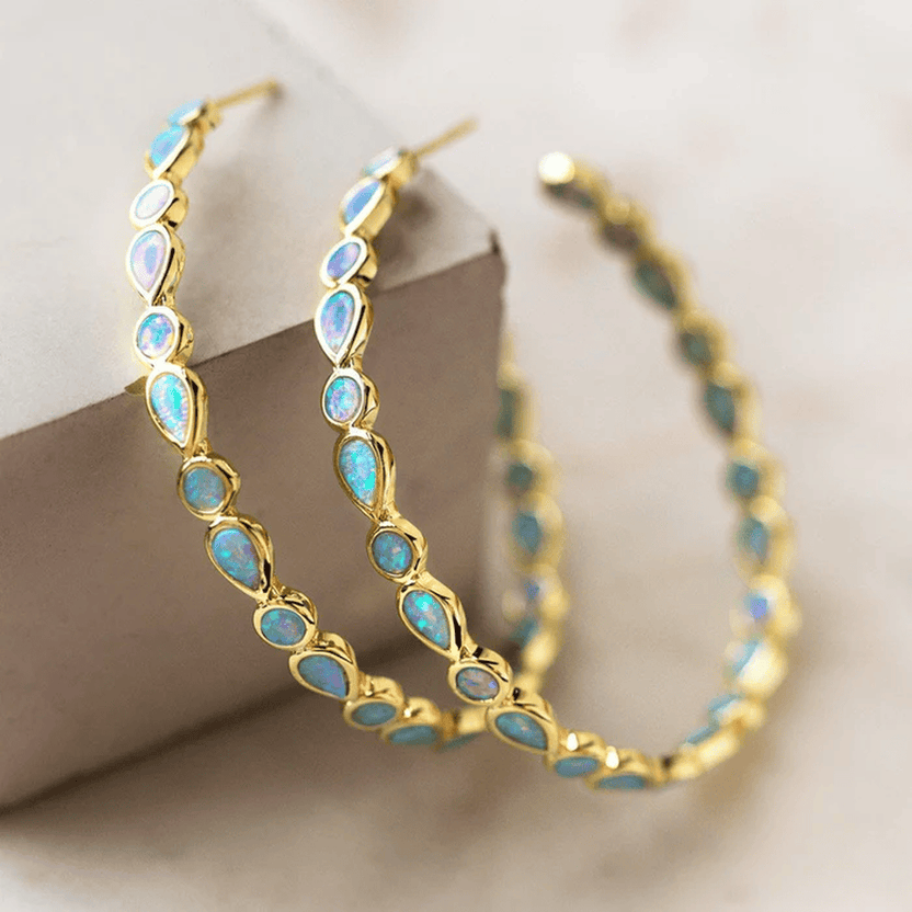 Pendientes vintage de ópalo azul con halo