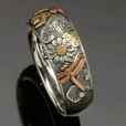 Anillo vintage de girasol y libélula