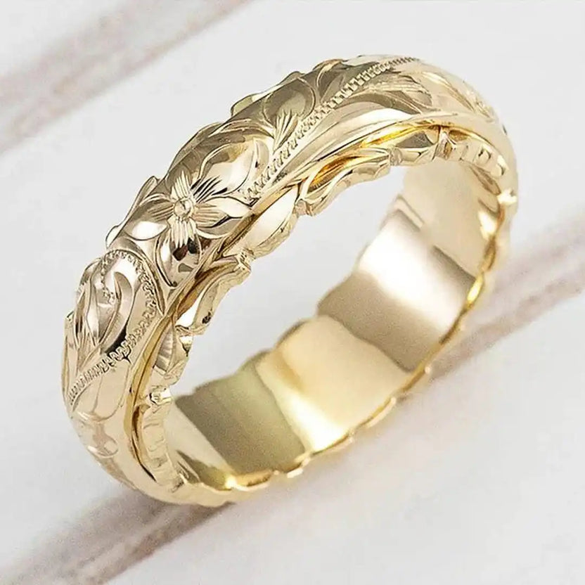 Anillo de flor en oro antiguo