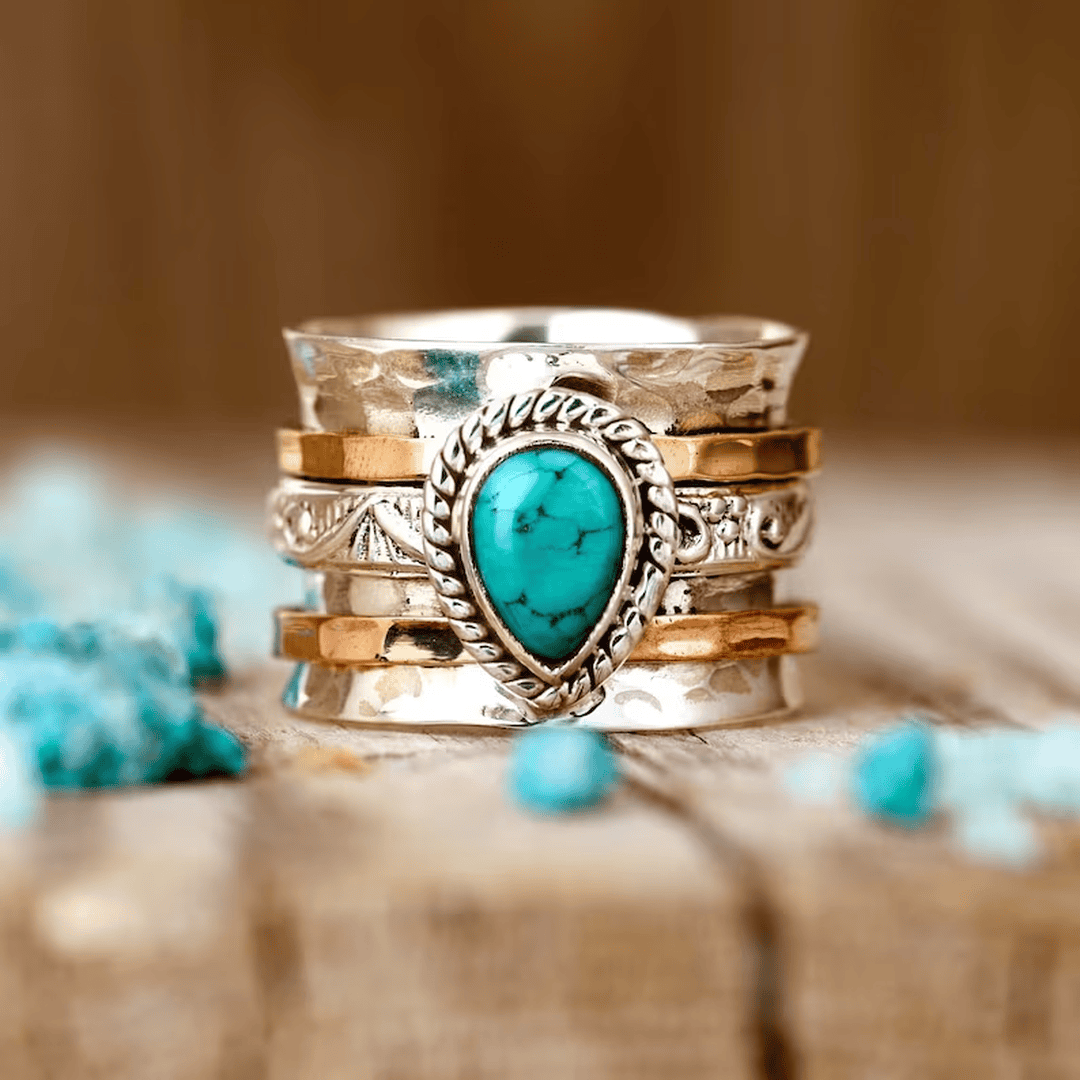 Anillo antiguo de turquesa con incrustación de oro y plata