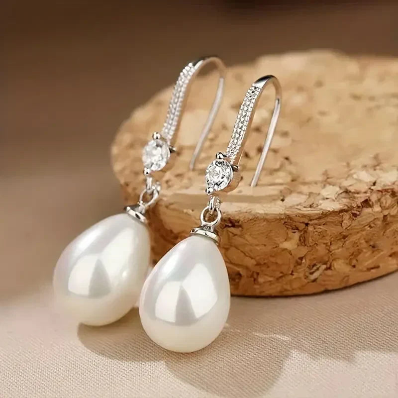 Pendientes colgantes de perla susurrante