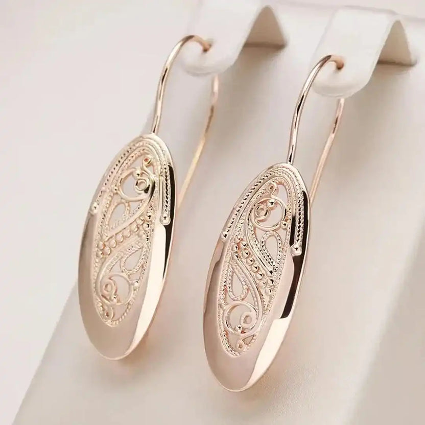 Pendientes de gota de brillo dorado