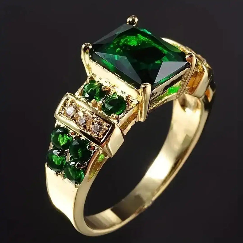 Anillo exquisito atemporal de esmeralda