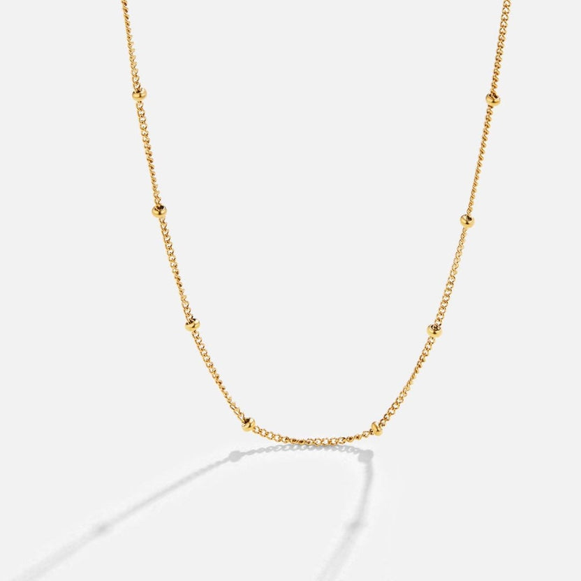 Collar dorado elegante y con estilo de capas — Carmen, Lucía & Rocío