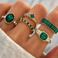 Conjunto Carmen, Lucía & Rocío de anillos exquisitos de oro con esmeralda