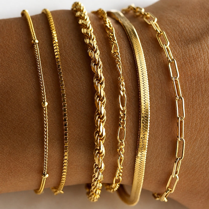 Set de pulseras apilables doradas Allure