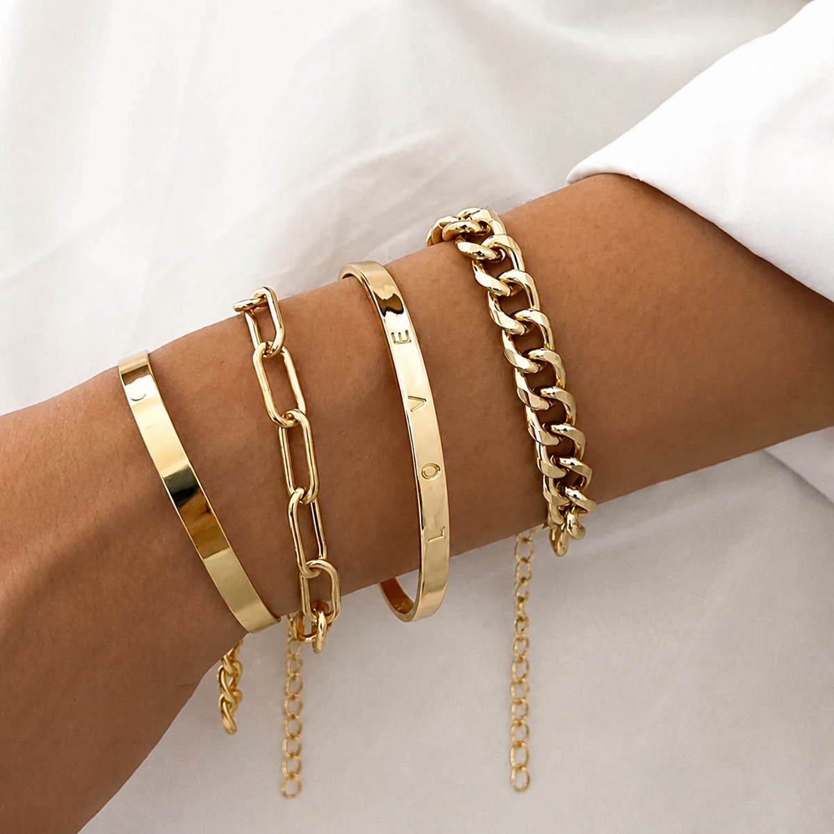 Set de pulseras doradas Elan