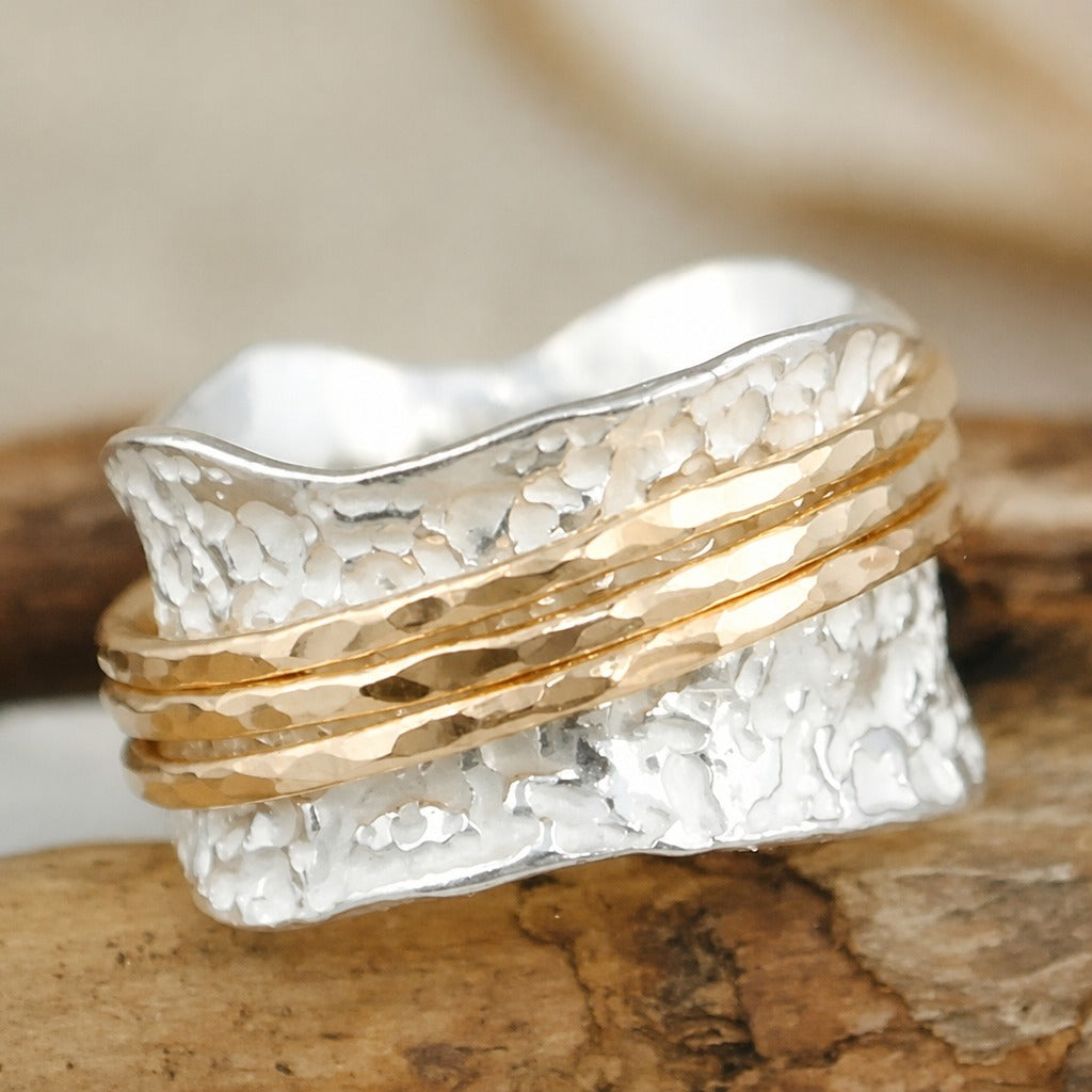 Anillo vintage giratorio dorado y plateado
