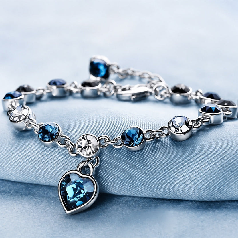 Pulsera de oro blanco con corazón marino luminoso