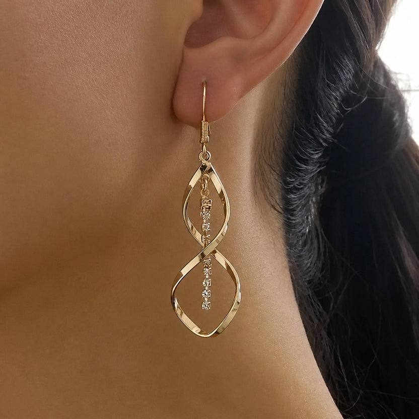 Pendientes dorados celestiales con rayo de sol