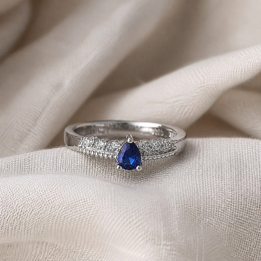 Anillo de pareja con zafiro ovalado