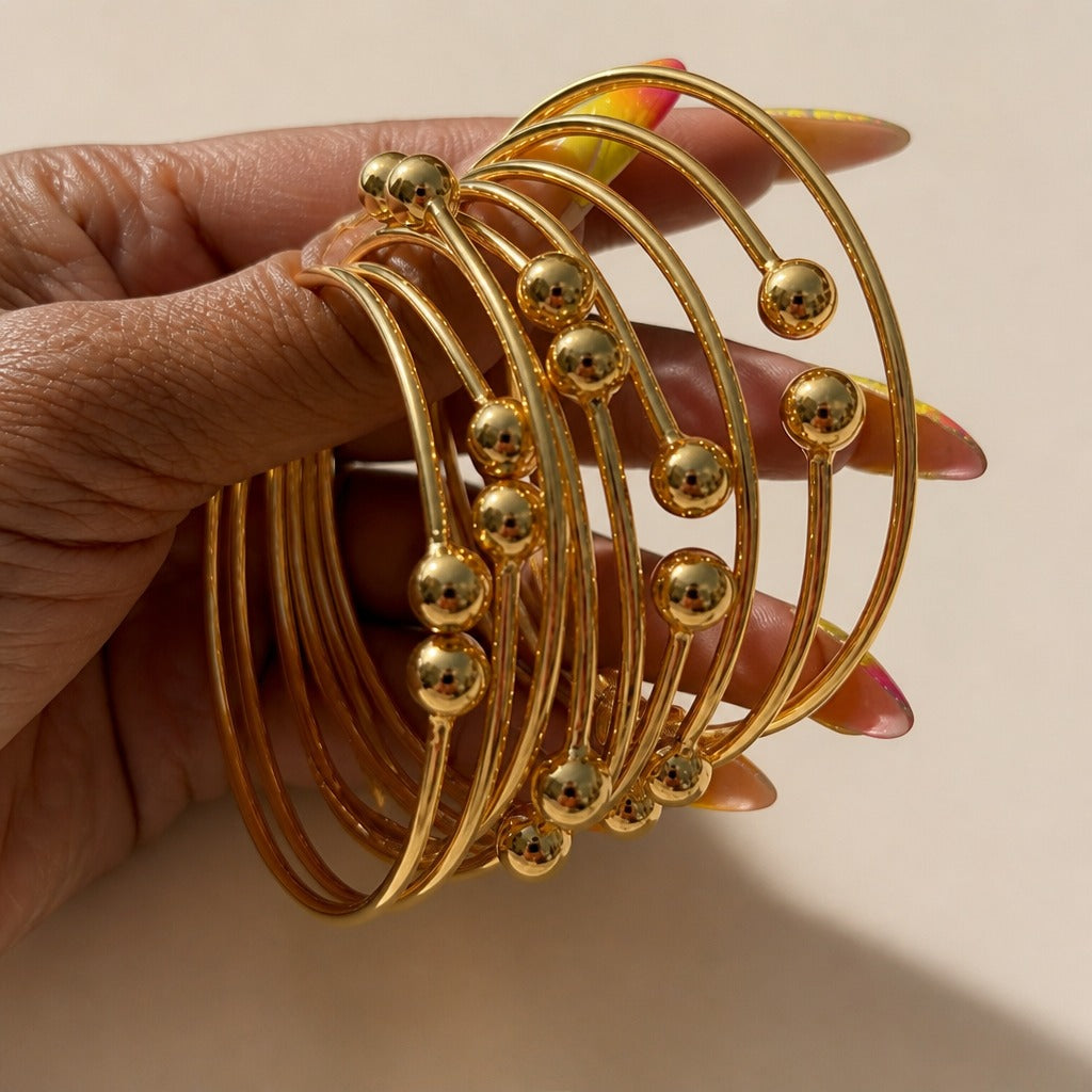 Set de brazaletes dorados imperiales