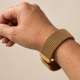 Pulsera trenzada chapada en oro