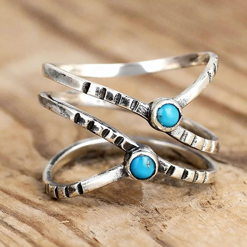 Anillo infinito con cruz de turquesa