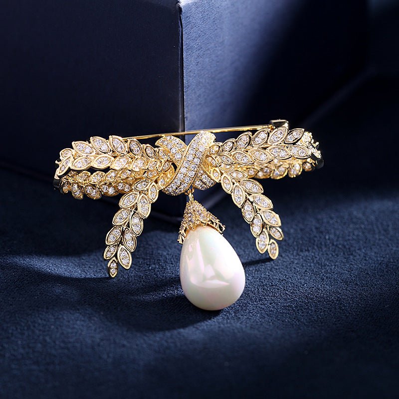Broche de lazo con perlas colgantes – imagen 2