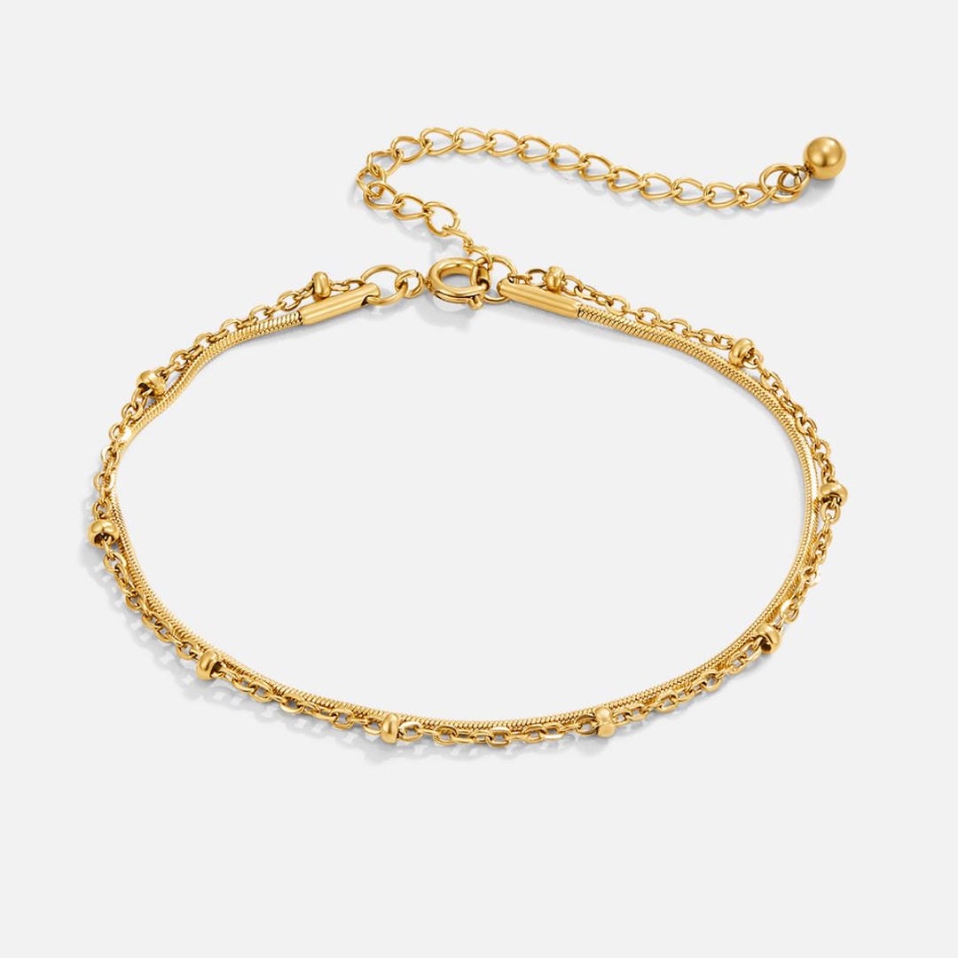 Pulsera dorada en capas de lujo