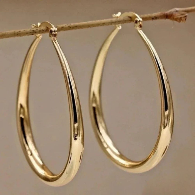 Pendientes de aro dorados elevados