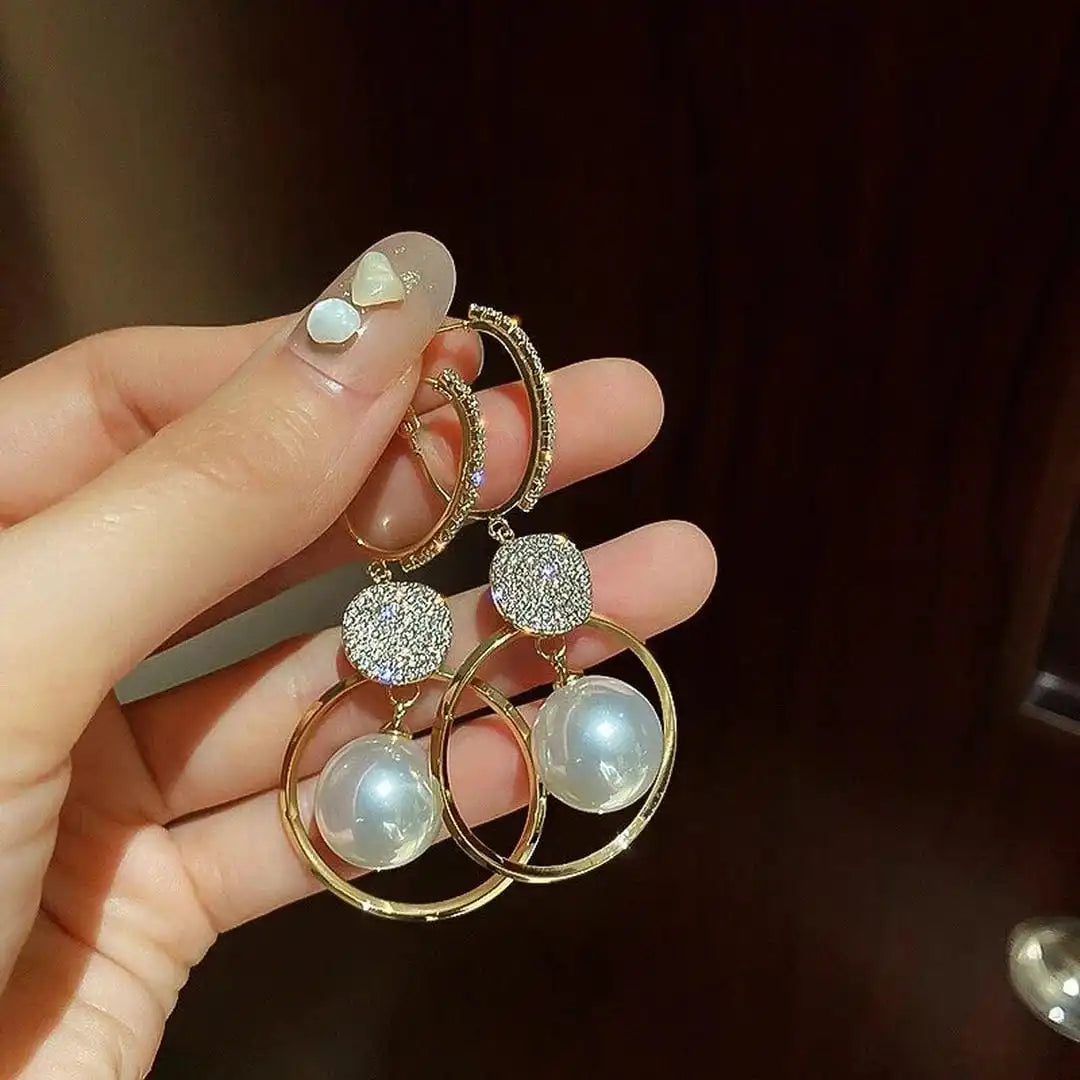 Pendientes con perlas cultivadas y bolas adornadas – imagen 3