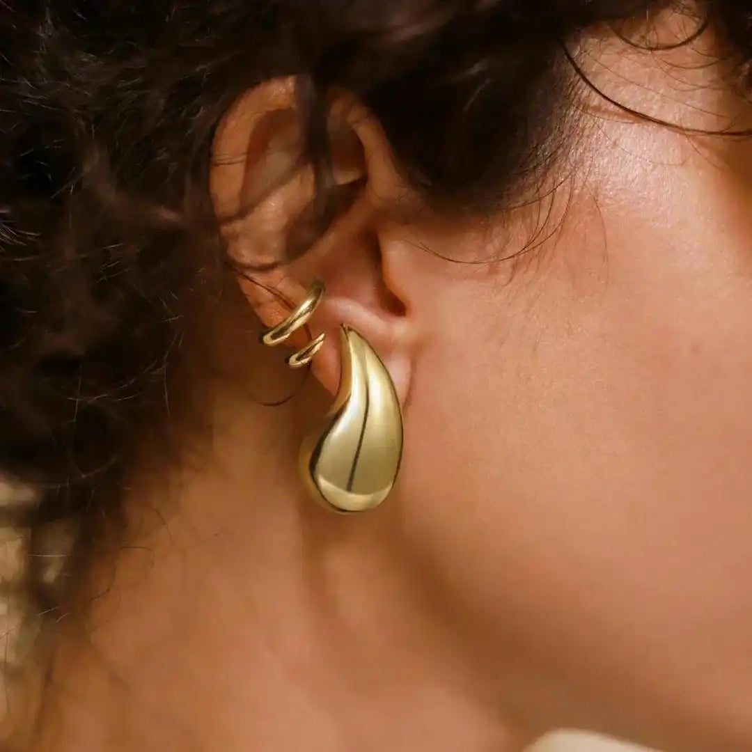 Pendientes de botón en forma de gota luminosos – imagen 3