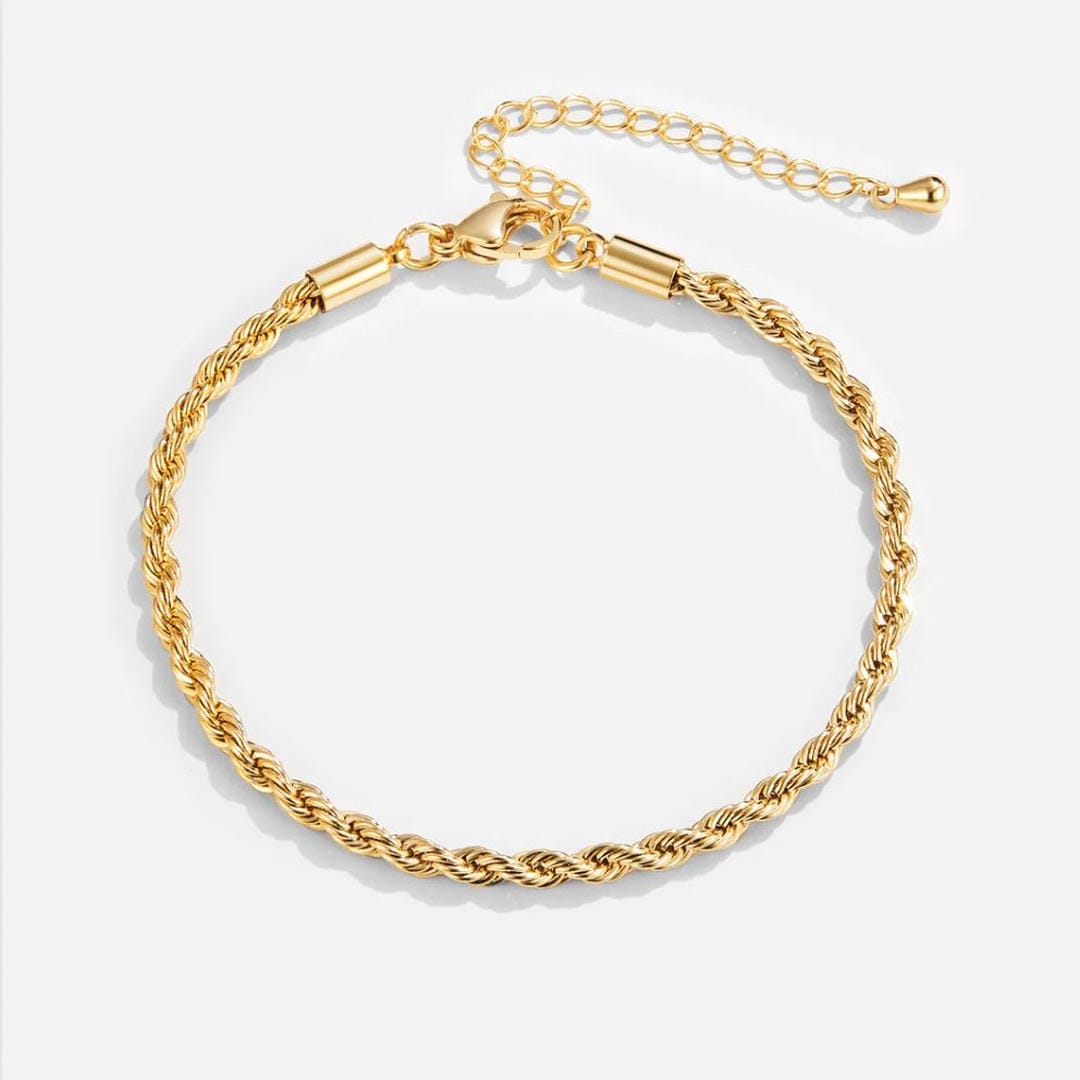 Pulsera dorada moderna y chic